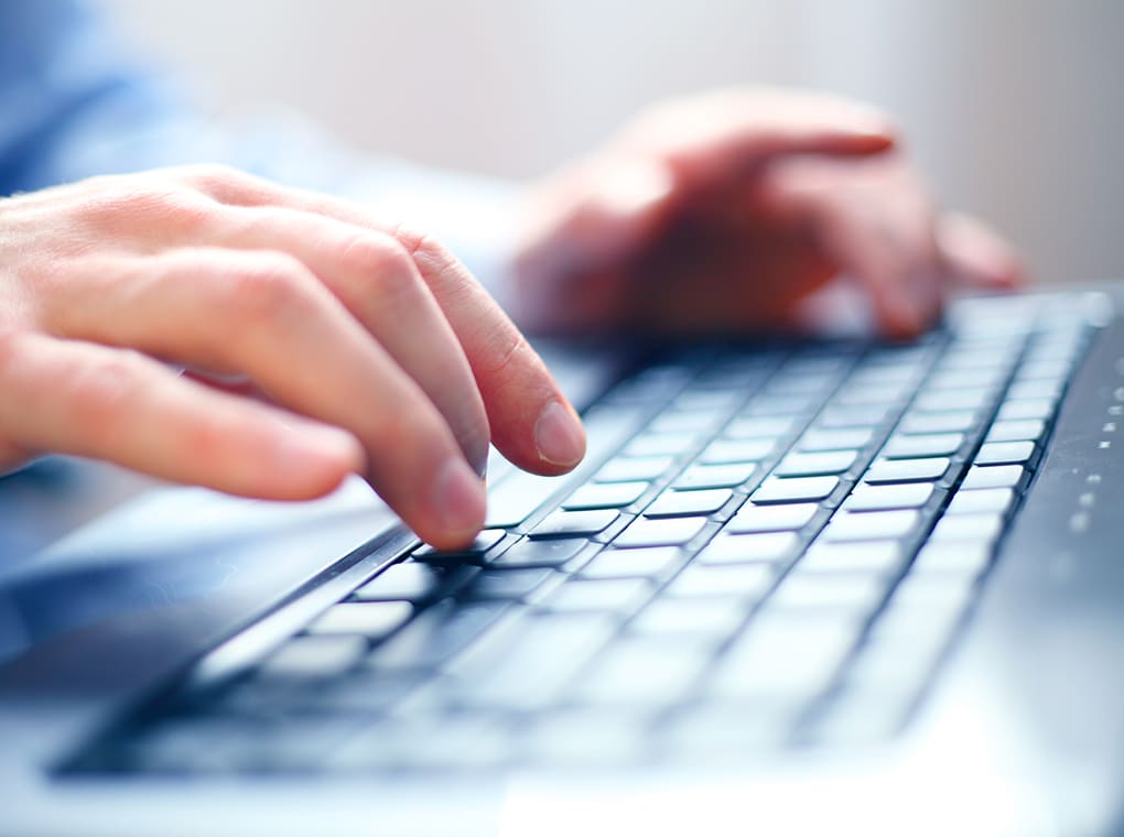 image,of,man's,hands,typing.,selective,focus