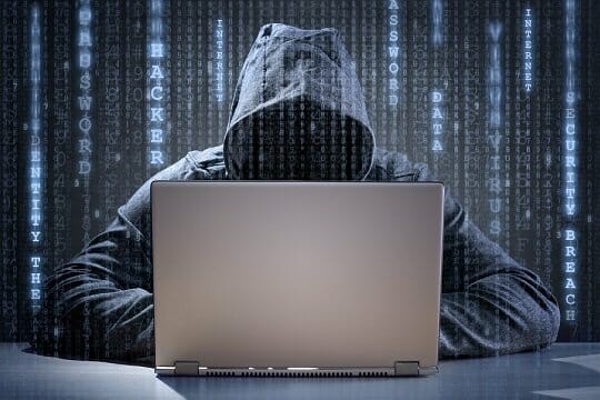 hacker at a computer screen
